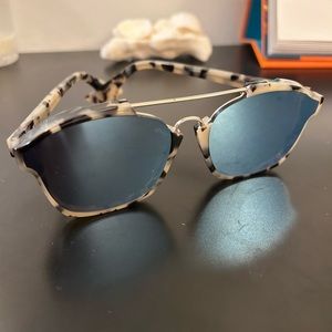 Dior metallic aviator sunglasses with white and black  tortoise shell.